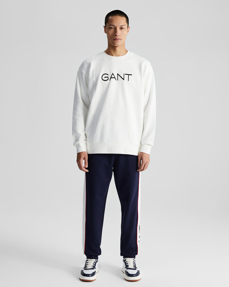 Bawełniane spodnie dresowe męskie z nadrukiem regular fit białe