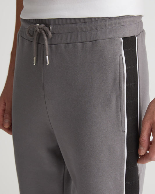 Bawełniane spodnie dresowe męskie z nadrukiem regular fit szare