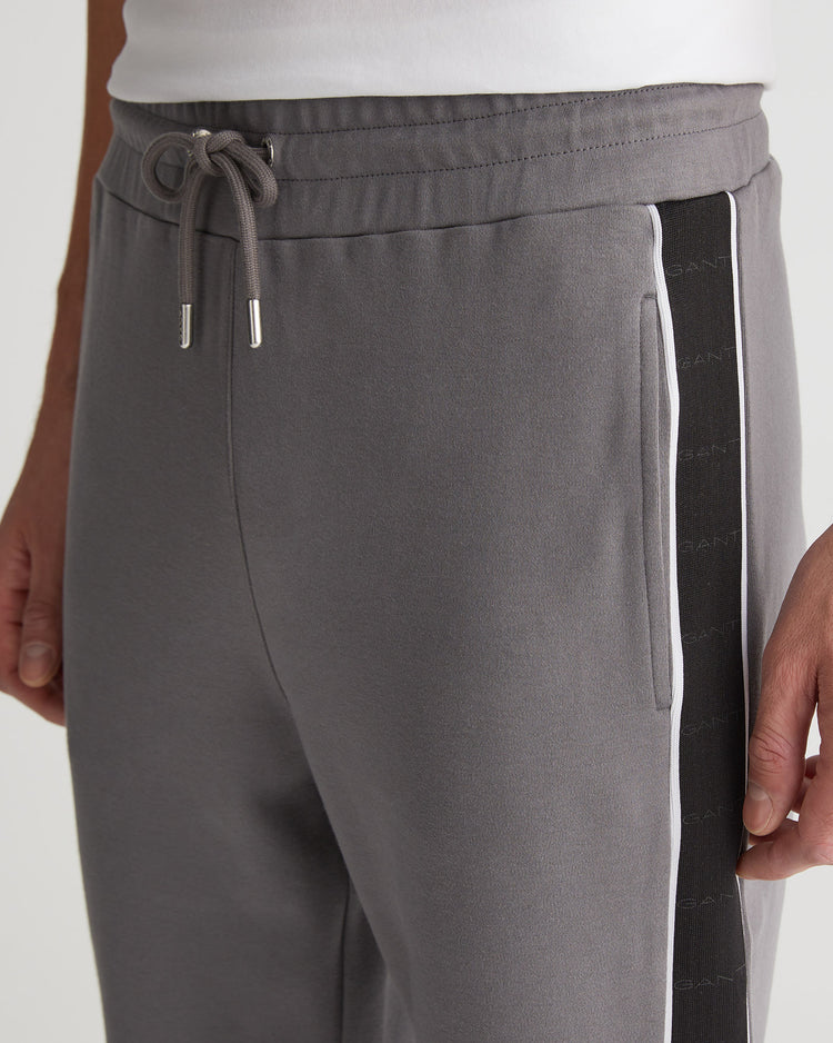 Bawełniane spodnie dresowe męskie z nadrukiem regular fit szare