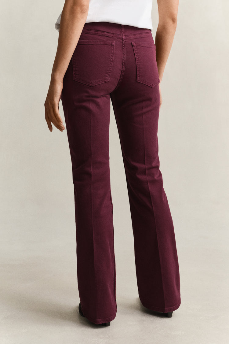 Jeansy kolorowe damskie flare fit bordowe