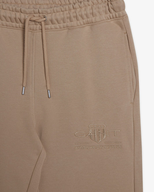 Spodnie dresowe damskie regular fit beżowe