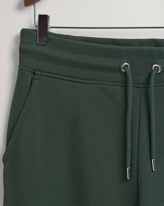 Męskie zielone spodnie dresowe o kroju relaxed fit