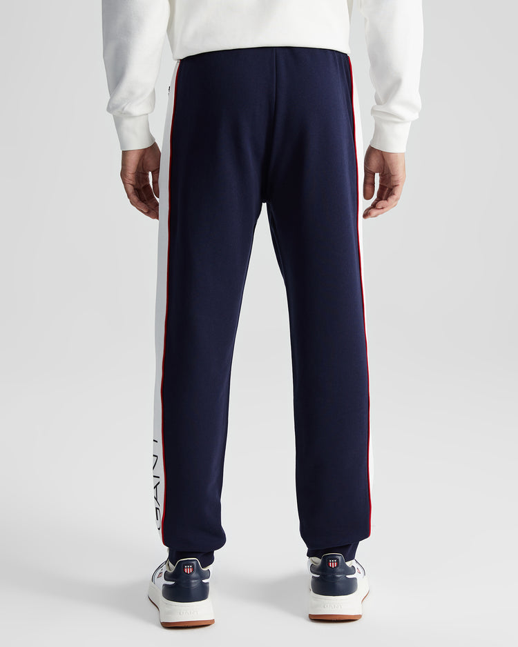 Bawełniane spodnie dresowe męskie z nadrukiem regular fit białe