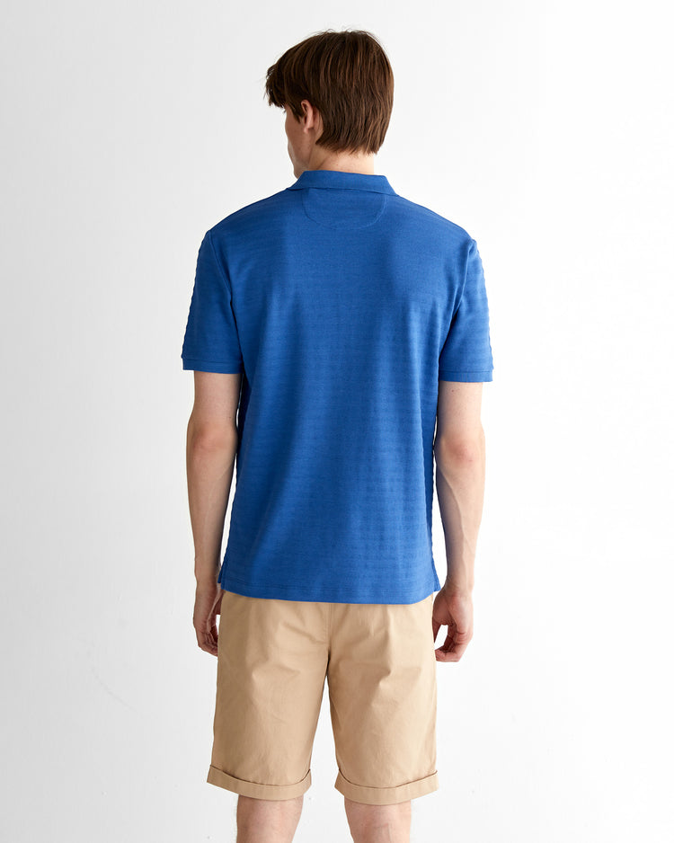 Męski granatowy polo o regularnym kroju w paski