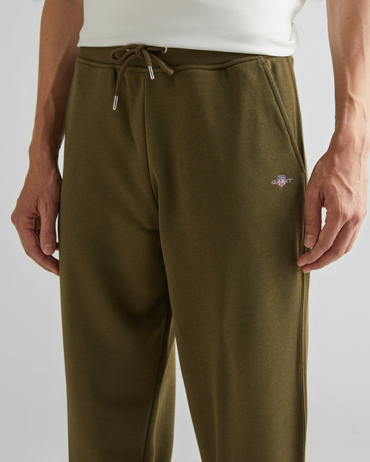 Spodnie dresowe męskie regular fit zielone