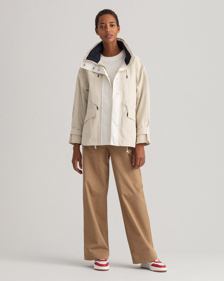 Kurtka damska zapinana na guziki z długim rękawem beżowa