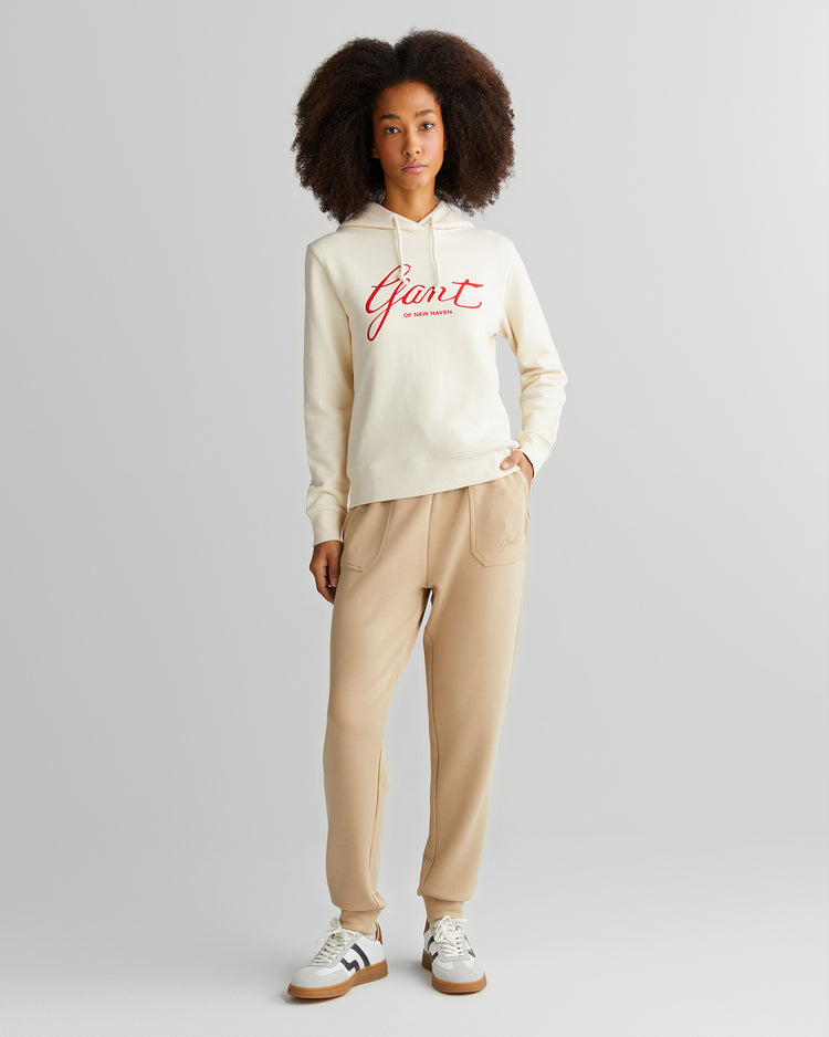 Spodnie dresowe damskie z nadrukiem regular fit beżowe