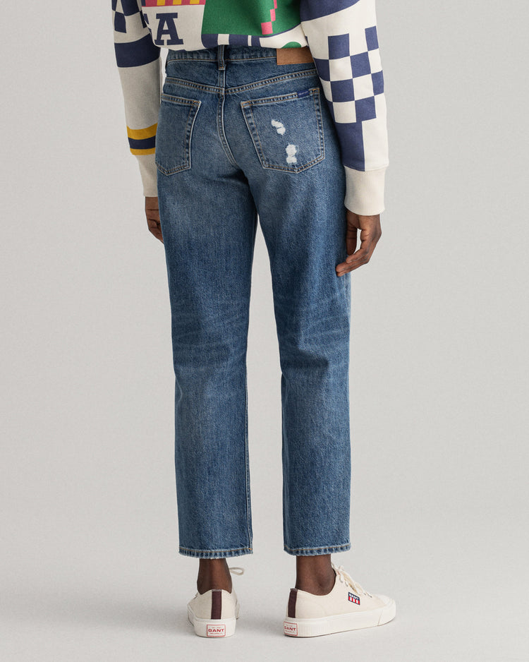 Bawełniane spodnie jeansowe damskie relaxed fit niebieskie