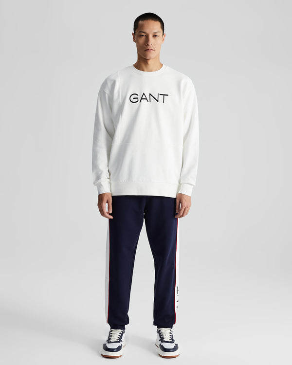 Bawełniane spodnie dresowe męskie z nadrukiem regular fit białe