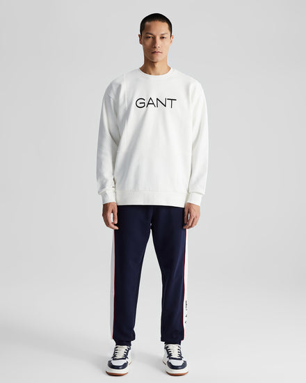 Bawełniane spodnie dresowe męskie z nadrukiem regular fit białe