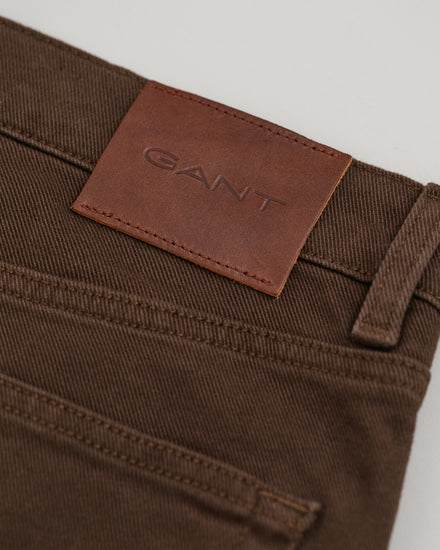 Spodnie jeansowe męskie slim fit brązowe