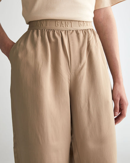 Damskie beżowe regular fit spodnie