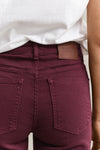 Jeansy kolorowe damskie flare fit bordowe