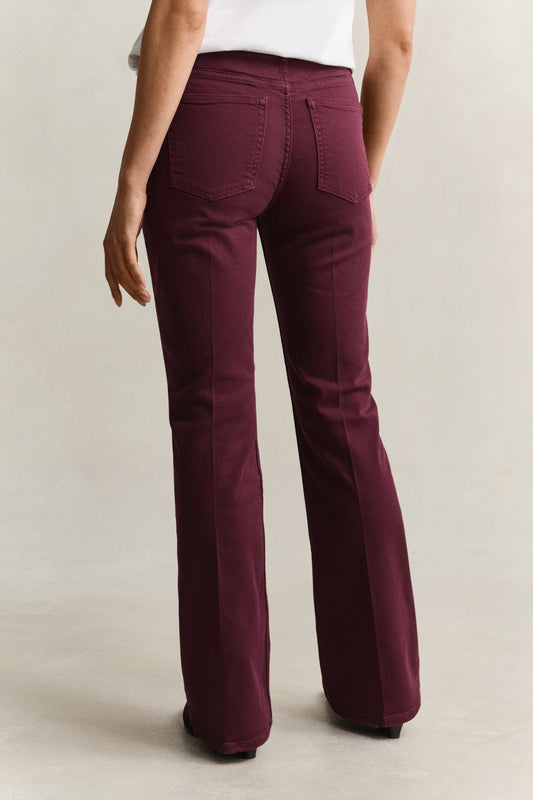 Jeansy kolorowe damskie flare fit bordowe