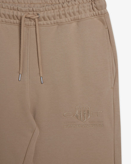 Spodnie dresowe damskie regular fit beżowe