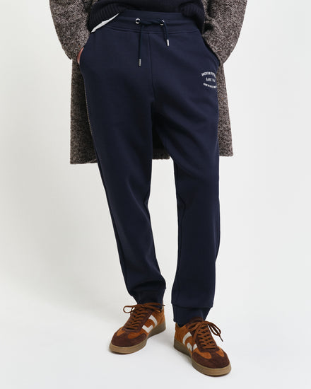 Spodnie dresowe męskie z nadrukiem regular fit granatowe