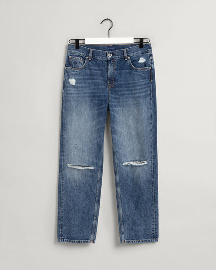 Bawełniane spodnie jeansowe damskie relaxed fit niebieskie