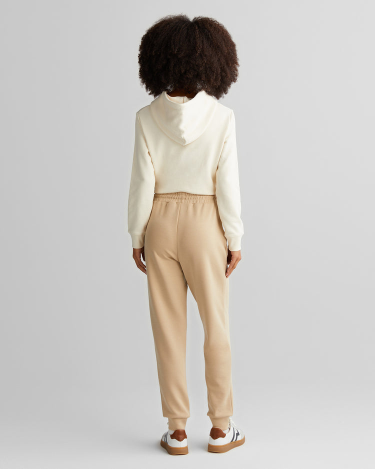 Spodnie dresowe damskie z nadrukiem regular fit beżowe