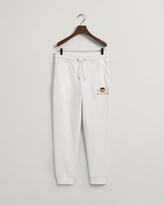 Spodnie dresowe męskie z nadrukiem regular fit kremowe