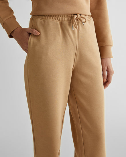 Spodnie dresowe damskie relaxed fit beżowe