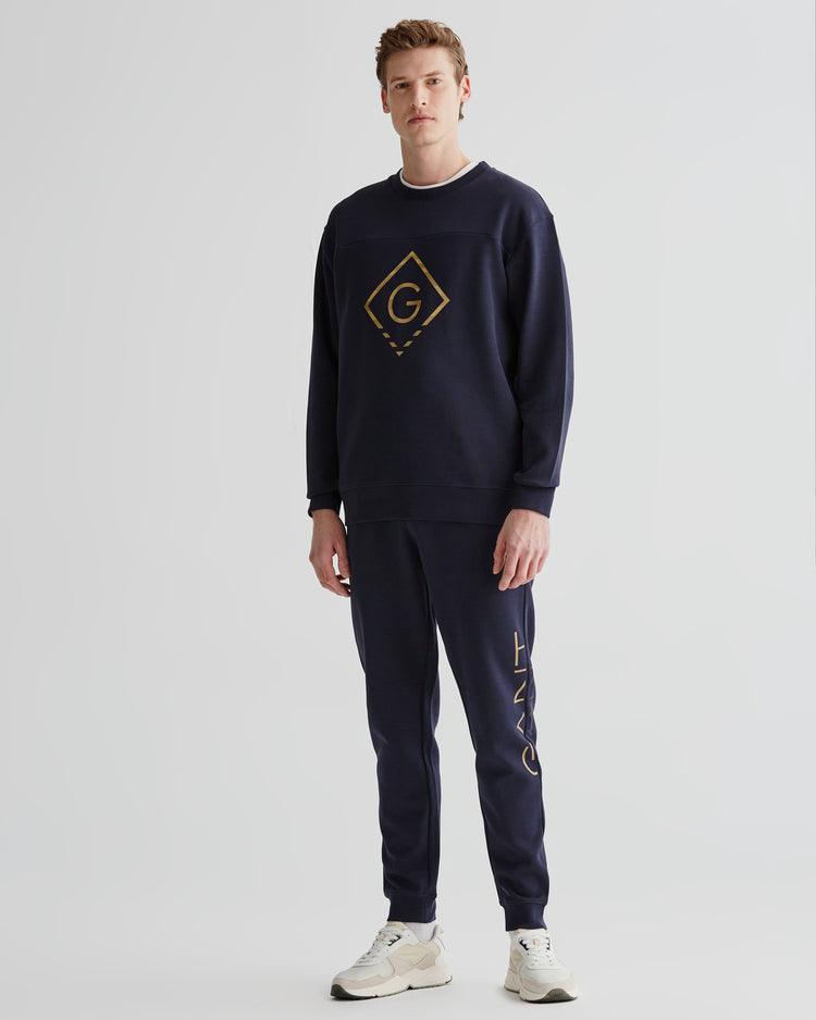 Spodnie dresowe męskie z nadrukiem regular fit granatowe