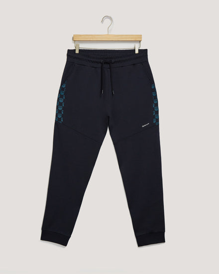 Spodnie dresowe męskie z nadrukiem regular fit granatowe