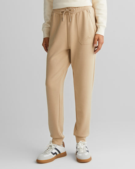 Spodnie dresowe damskie z nadrukiem regular fit beżowe