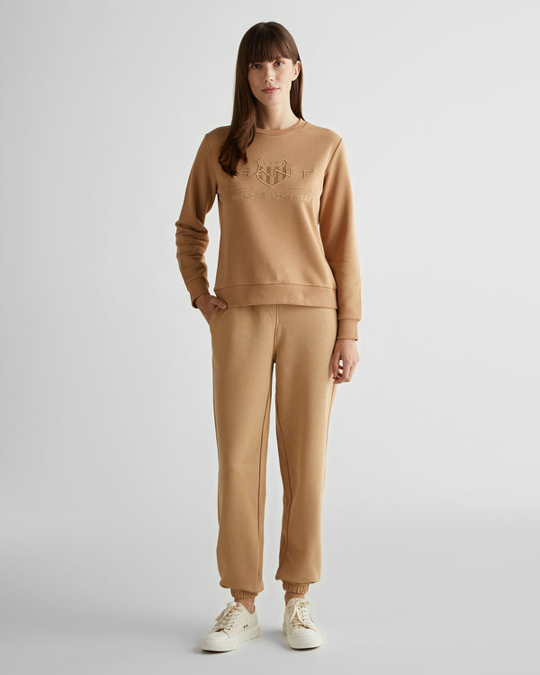 Spodnie dresowe damskie relaxed fit beżowe
