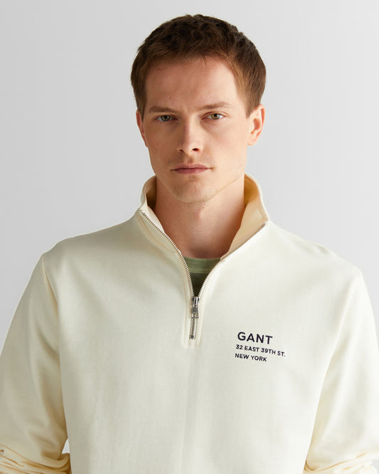 Bluza męska z nadrukiem z zamkiem do połowy regular fit kremowa