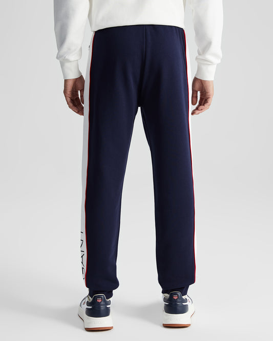 Bawełniane spodnie dresowe męskie z nadrukiem regular fit białe