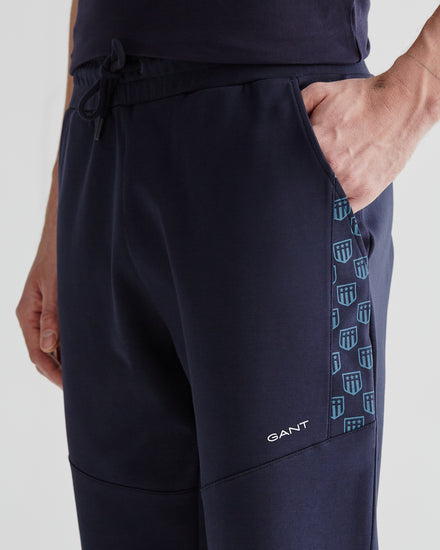 Spodnie dresowe męskie z nadrukiem regular fit granatowe