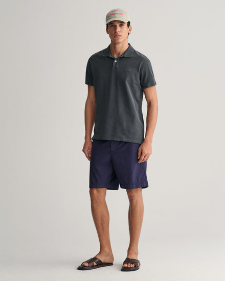 Wypłowiała koszulka polo z piki