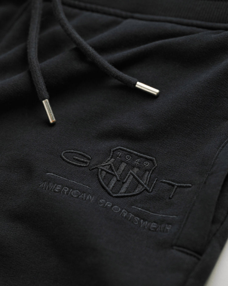 Bawełniane spodnie dresowe męskie z nadrukiem regular fit czarne